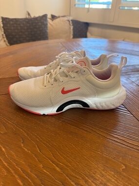 Nike White Athletic Sneakers with Coral Accent